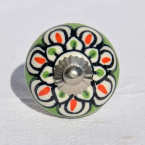 Bouton vert, orange et blanc