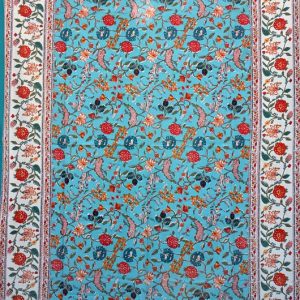 Tenture indienne fleurs rouges et roses sur fond turquoise